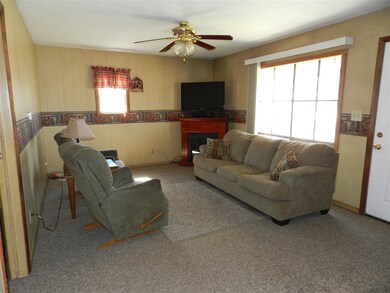 Living Room offers large picture window over looki