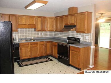 Kitchen with full appliance package with Oak cabinets