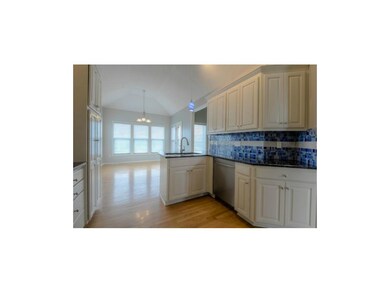Updated Chefs kitchen with new glass tiled backspl