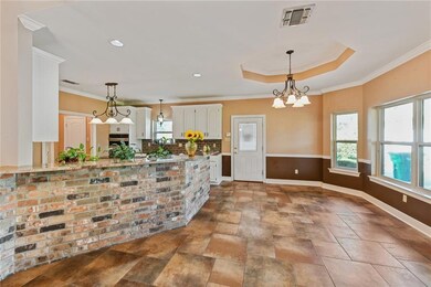 Open kitchen to both living room and breakfast are