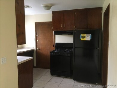 Kitchen gas stove and  hood vent -refrigerator inc