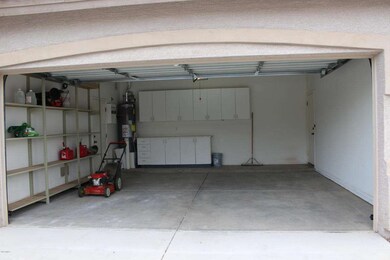 Garage with Garage cabinets