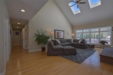 Light filled living room offering a...
