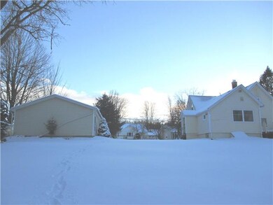 Exterior Back. View of home and garage. Lot is app
