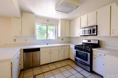 The kitchen feature stainless steel stove/range wi