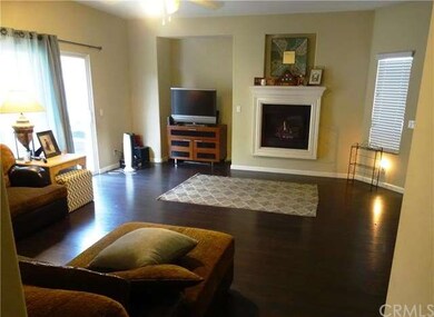 Living room features gorgeous wood laminate floori