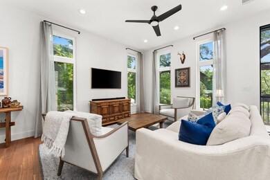 Living room with recessed lighting, ceiling fan, 