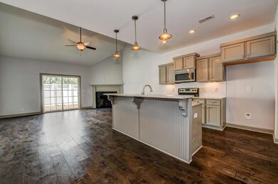 Kitchen offers granite counters, tile backsplash - custom cabinets