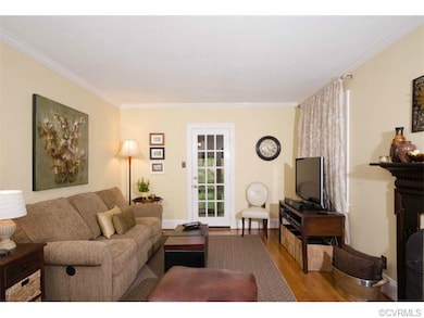 This view of the living room shows the French door