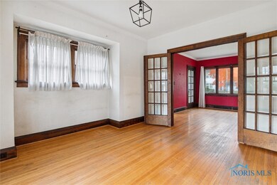 Formal dining area leads to kitchen