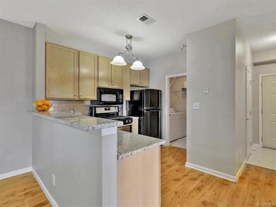 New flooring throughout the kitchen, dining and li