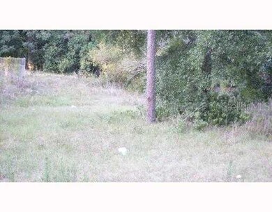 Exterior Front - THIS IS THE GRASS ROAD ENTRANCE FROM APOPKA BLVD.!