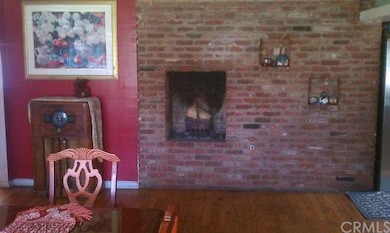 Dining room has it's own fireplace.