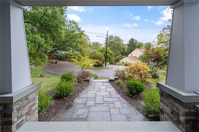 Enjoy the quiet street, tucked back from the busier roads, as the landscaped stone patio welcomes you home.