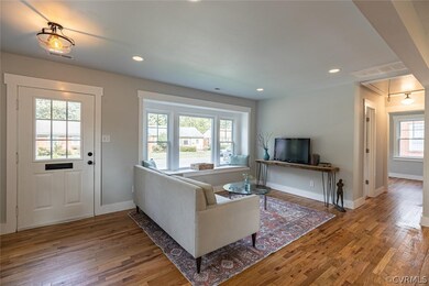 Refinished hardwood floors throughout the home.