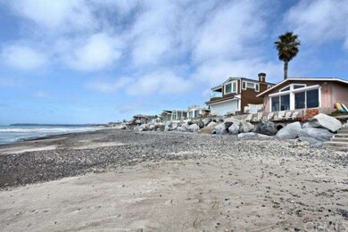 Walk out onto the sand from your beach cottage pat