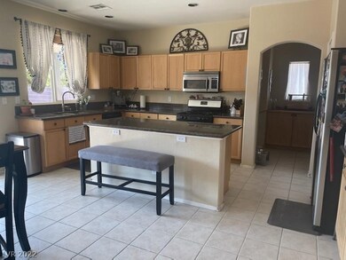 The kitchen has plenty of granite counter space an