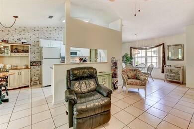 LIVING ROOM OPEN TO KITCHEN, DINING AREA