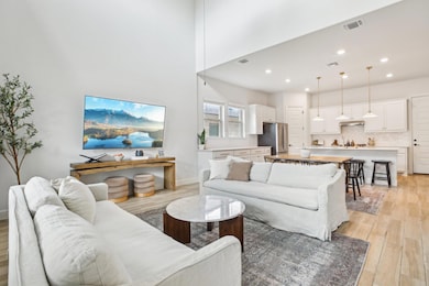 Living area featuring light wood-style floors and