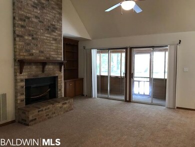 View to screened in patio and back yard fire pit