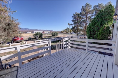 Wooden deck featuring a mountain view