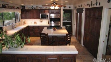 Kitchen boast newer appliance's, 2 pantry area's, 