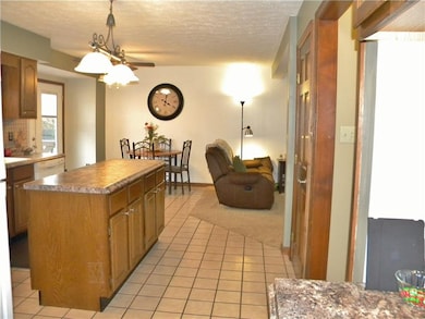 Large Eat In Kitchen leading out to back deck and 