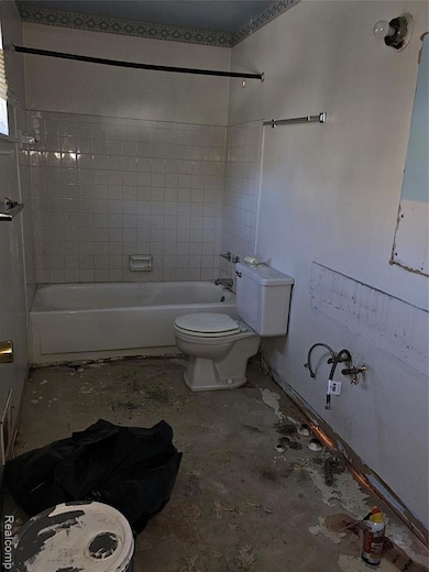 Full bathroom with shower / bathtub combination and toilet