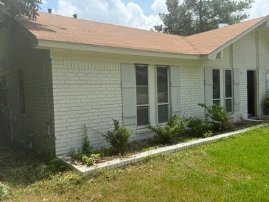 Exterior space with a yard