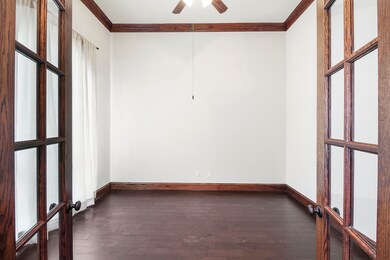 Home Office has relaxing front yard views. Notice the crown molding throughout the Home. Offers window treatment and ceiling fan.