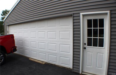 Garage is a bit over-sized, with two-man doors