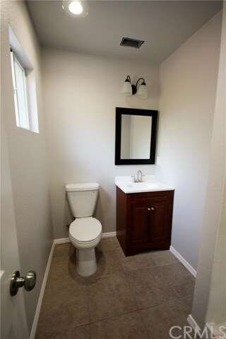 Nice master bath with new vanity and flooring.