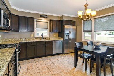 This large kitchen features a large area for a din