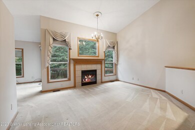 Vaulted Living room with gas fireplae