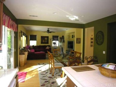 Eat Area and Family Room with Fireplace