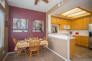 Dining area with new ceiling fan.