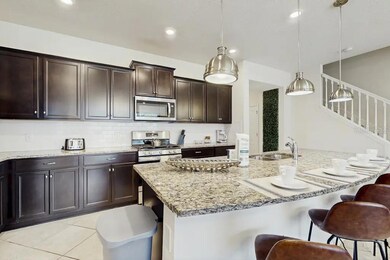 7472 Oakmoss Loop, Davenport, FL 33837 - photo 2