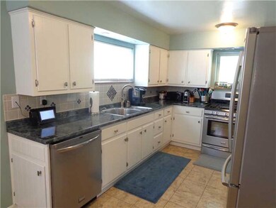Kitchen. Refinished kitchen cabinets with new hard