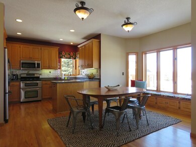The kitchen and dinette are the centerpiece of the