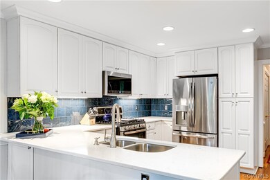 Kitchen featuring appliances with stainless steel