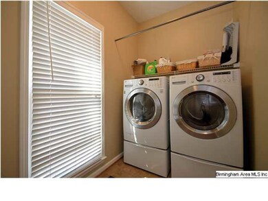 Laundry room is located adjacent to the kitchen