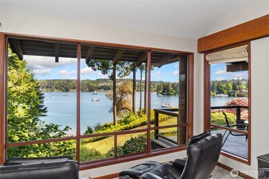 MARINE Views from the living room with wall to ceiling windows plus vault and a wrap around view.