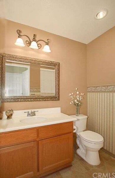 Bathroom 1; Downstairs guest bathroom.