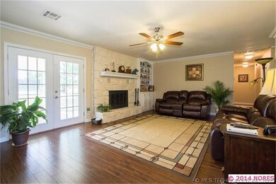The Living Area boasts New Paint, Flooring, Crown