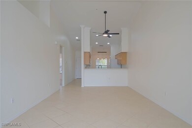 Unfurnished living room with a ceiling fan, basebo