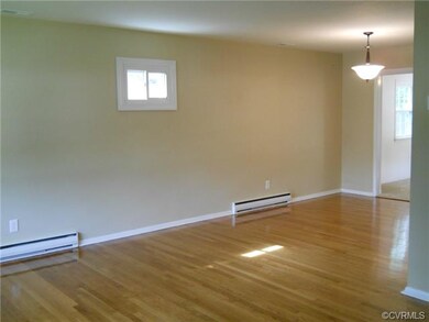 Dining Room with Refinished Hardwood Floors and Ne