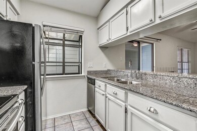 Kitchen featuring appliances with stainless steel