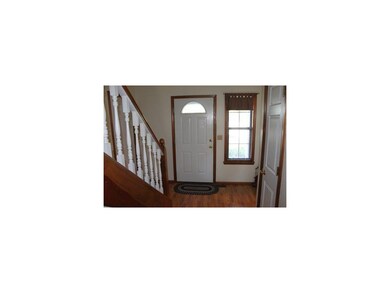 Inside front door, entryway.