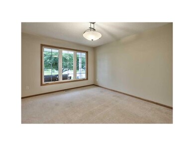 Living Room. VINYL WINDOWS AND UPDATED LIGHT FIXTU