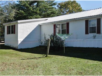 Exterior Back. Wood Frame Addition